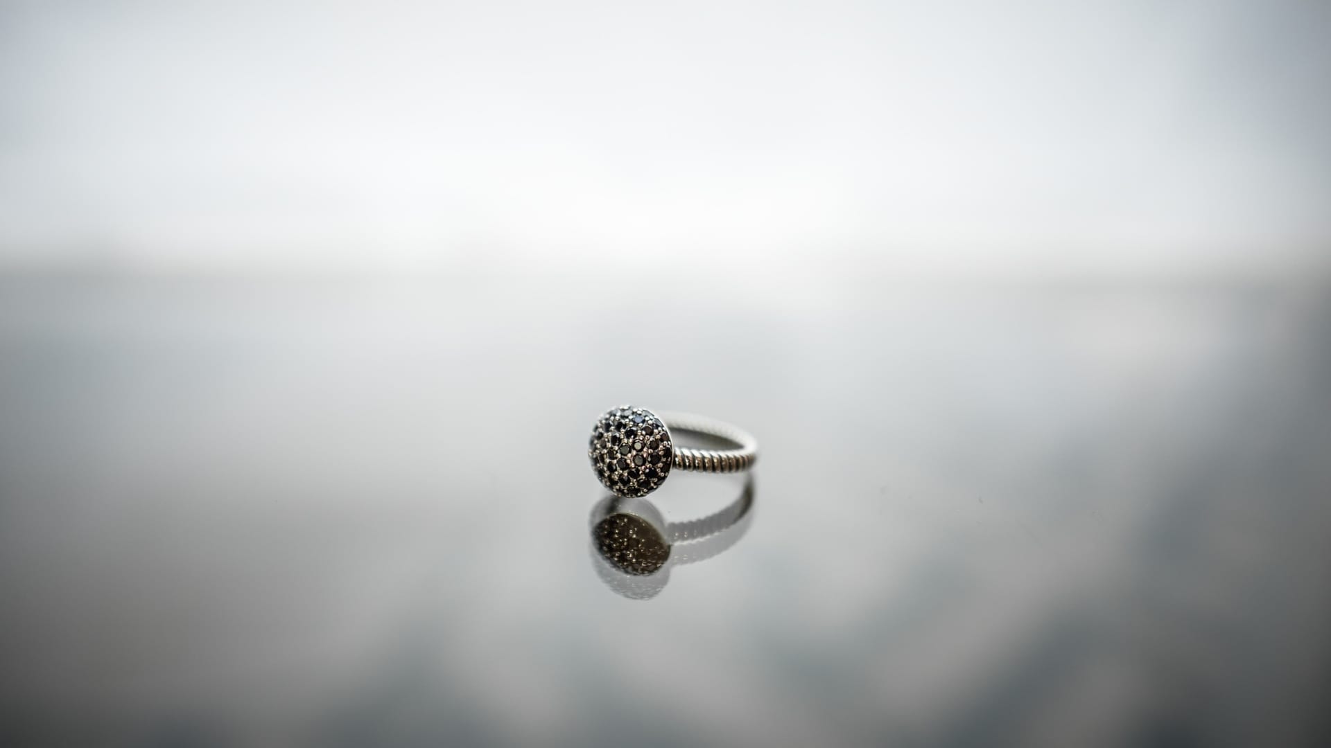 Jewelry pieces laid on a workshop surface